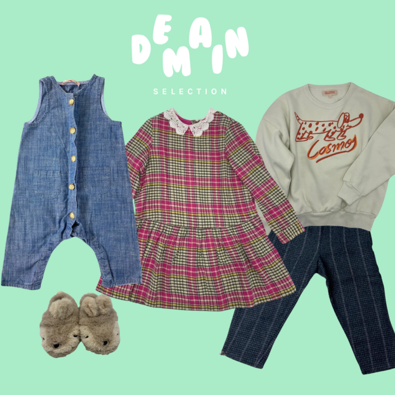 Selection of children’s clothing from Demain on a mint-green background, including a denim playsuit, a pink checkered dress with lace collar, a sweatshirt with a dog illustration, checked trousers and plush bunny slippers.