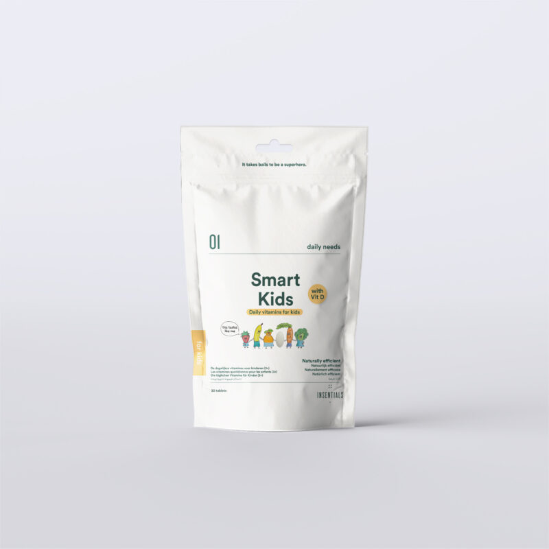Smart Kids vitamins by Insentials, shown in their white pouch packaging with colourful childlike illustrations. For each pack sold, €1 is donated to KickCancer to support research for better treatments.
